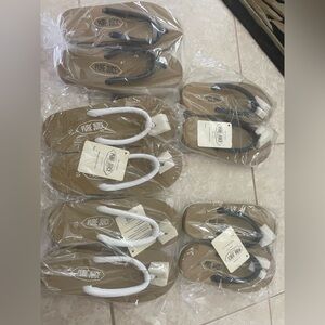 Pure Juice Flip Flops in black in white size 10 new with tags!